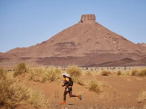 A marathon participant runs through the Sahara desert in Morocco. (AFP/Jean-Philippe Ksiazek)