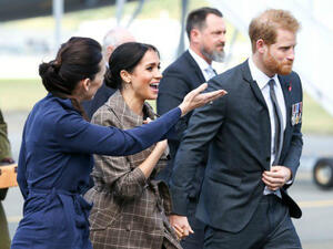 Britain’s Prince Harry and his wife Meghan with New Zealand’s Prime Minister Jacinda Ardern after arriving at the Wellington International Airport Military Terminal in Wellington. (Source: AFP) Britain’s Prince Harry and his wife Meghan with New Zealand’s Prime Minister Jacinda Ardern after arriving at the Wellington International Airport Military Terminal in Wellington. (Source: AFP)