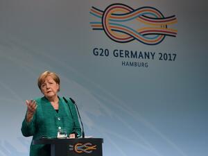 German Chancellor Angela Merkel speaks during the final press conference on the second day of the G20 Summit in Hamburg, Germany, July 8, 2017 (Patrik Stollarz/AFP)