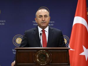 Turkish Foreign Minister Mevlut Cavusoglu gives a press conference in Ankara on July 25. (AFP)