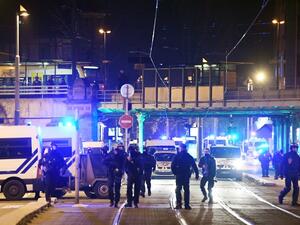 French police officers block the road near the site where Cherif Chekatt, the alleged gunman who had been on the run since allegedly killing three people at Strasbourg's popular Christmas market. (AFP)
