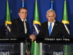 Brazilian President Jair Bolsonaro (L) and Israeli Prime Minister Benjamin Netanyahu shake hands during a joint press conference at the prime minister's residence in Jerusalem on March 31, 2019. (AFP/ File) Brazilian President Jair Bolsonaro (L) and Israeli Prime Minister Benjamin Netanyahu shake hands during a joint press conference at the prime minister's residence in Jerusalem on March 31, 2019. (AFP/ File)