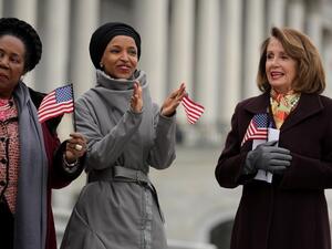 (L-R) Rep. Shelia Jackson Lee (D-TX), Rep. Ilhan Omar (D-MN) and Speaker of the House Nancy Pelosi (D-CA) rally with fellow Democrats during a rally on the East Steps of the U.S. Capitol. (AFP/ File)