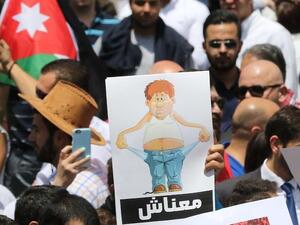 Thousands of Jordanians take to the streets of Amman. (AFP/ File)