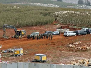 A position near the southern Lebanese village of Kfar Kila shows members of the Israeli military, excavators, trailers and other vehicles operating across on the other side of the border. (AFP)