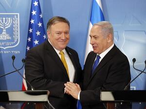 U.S. Secretary of State Mike Pompeo. left. is greeted by Israeli Prime Minister Benjamin Netanyahu. (AFP/File)