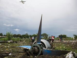 People gather at the site of a cargo plane crash, on a small island in the White Nile river, close to Juba airport, in South Sudan. (AFP/ File)