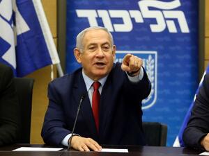 Heads of parties in Israeli Prime Minister Benjamin Netanyahu's coalition have agreed to hold early elections in April (AFP)
