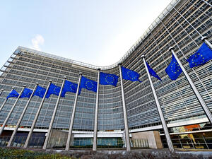 EU flags blown by wind in front of the European Commission Headquarters. (Shutterstock/ File)