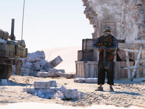 Man terrorist wearing a mask and holding a gun. (Shutterstock/ File Photo)