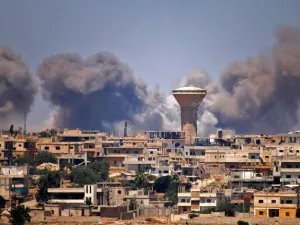 Smoke covers air after an air strike in Syria. (AFP)