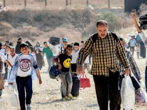 At least 4,000 Syrians return terror-free hometown in 2 weeks. (AFP)