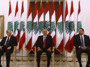 Lebanese prime minister Saad Hariri (R) meets President Michel Aoun (L) and Parliament speaker Nabih Berri(C) at the presidential palace in Baadba. (AFP File Photo)