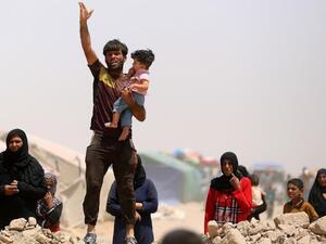 الفلوجة تحت حصار داعش والحشد الشعبي