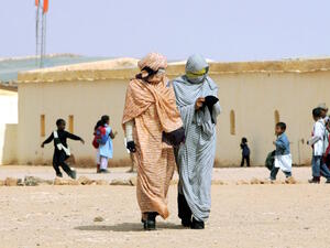 Refugees from Western Sahara walk through a school in a refugee camp in the Tindouf reigon. (AFP/File)