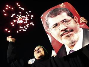 Experts say Morsi could face the death penalty in his upcoming trial this Tuesday in the latest of a series of harsh sentences handed down to Brotherhood affiliates in Egypt. (AFP/File) Experts say Morsi could face the death penalty in his upcoming trial this Tuesday in the latest of a series of harsh sentences handed down to Brotherhood affiliates in Egypt. (AFP/File)