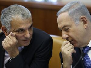 Hush-hush talks: Israeli Prime Minister Benjamin Netanyahu deliberates with Moshe Kahlon, Israel's Finance Minister (AFP/File Photo)	