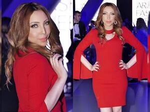 الفنانة هاجر فؤاد بفستان أحمر ساحر بـ أسبوع الموضة في دبي