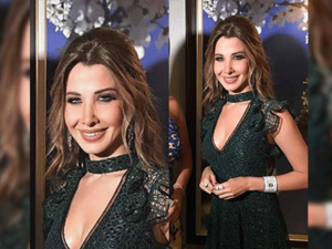 ارتدت نانسي عجرم فستان شبكي شفاف باللون الأخضر الداكن