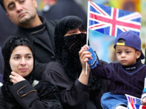 British Muslims waving flag in campaign one month before the May 2015 General Elections (AFP) 