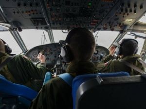 French soldiers aboard an aircraft search for debris from the crashed EgyptAir flight MS804 over the Mediterranean Sea. Egypt enlisted a submarine on May 22 to search the Mediterranean seabed for the black boxes of EgyptAir MS804. (AFP/File)