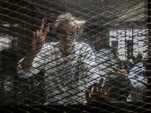 Photographer Mahmoud Abdel Shakour appears in an Egyptian court in August 2016. (AFP/File)