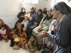 Egyptian women attend a lecture on female genital mutilation in Beni Suef. (Cris Bouroncle/AFP/Getty Images)