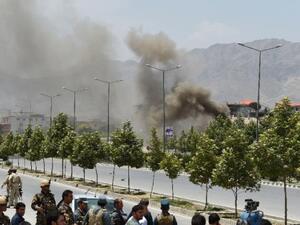 Black smoke billows from the Afghan parliament building in Kabul on June 22, 2015. (AFP/Shah Marai)