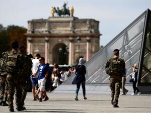 Soldiers patrol around the Louvre Museum in Paris on September 10, 2016. (AFP/File)