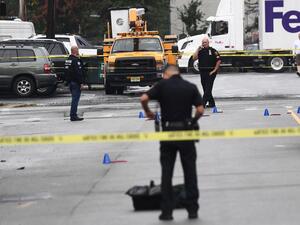 Law enforcement officers secure the area where they allegedly arrested terror suspect Ahmad Khan Rahami following a shootout in Linden, New Jersey, on September 19, 2016. (AFP/Jewel Samad)