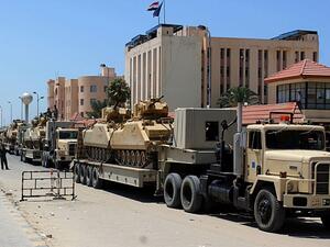 File picture shows an Egyptian miltary convoy in the North Sinai provincial capital El-Arish. (AFP/File)