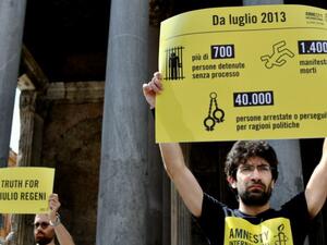 Amnesty International activists perform a flash mob on July 13, 2016, in Rome's Pantheon square to remember the victims of torture and enforced disappearances in Egypt. (AFP/File)