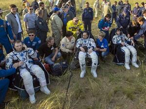Mission control Houston called it a "bull's-eye landing," despite the capsule coming in on its side instead of an upright position. (AFP/File)