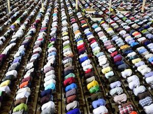 Bangladeshi Muslims offer Eid prayers at the start of the Eid al-Fitr holiday marking the end of Ramadan in Dhaka on July 18, 2015. (AFP/File)