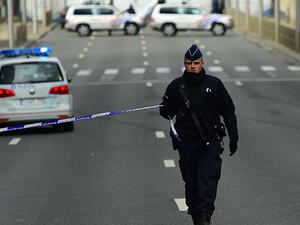 A police officers sets a security perimeter near Maalbeek metro station, on March 22, 2016. (AFP/File)