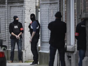 Belgian police conduct raids on 15 March, 2016. (AFP/File)
