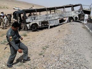 In April 2013 a bus hit a wrecked fuel tanker in the southern province of Kandahar. (AFP/File)
