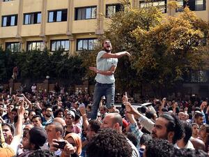 Egyptians protest a controversial deal to give two islands in the Red Sea to Saudi Arabia on Friday in Cairo. (AFP/Mohamed el-Shahed)