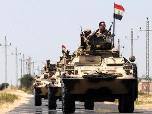 Egyptian security forces on their Armored Personnel Carriers. (AFP/File)