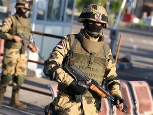 Egyptian army special forces man a temporary checkpoint outside Sharm el-Sheikh Airport. (AFP/File) 
