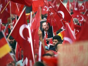 Supporters of Turkish President Recep Tayyip Erdogan rally in Cologne on July 31, 2016. (AFP/File)