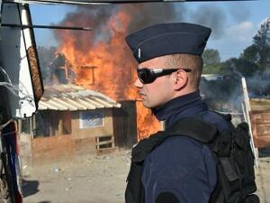 Officials expect the operation to become more difficult over the course of the week, after those who volunteered to leave are transported to accommodation centres and only those reluctant to give up on reaching Britain remain the camp. (AFP/File)