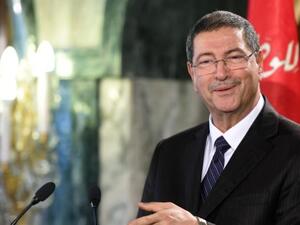 Tunisia's Prime Minister Habib Essid announces a new cabinet ministers list after presenting the list to the Tunisia's President Beji Caid Essebsi during a press conference at Carthage Palace in Tunis on January 23, 2015. (AFP/Fethi Belaid)