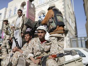 Houthis ride a truck while patrolling a street in Sana'a January 21, 2015. (Twitter)