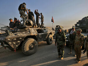 Iraqi forces gather in the area of al-Shourah, some 45 kms south of Mosul, as they advance towards the city to retake it from the Islamic State on Monday. (AFP/Ahmad al-Rubaye)