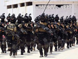 Iraqi special forces take part in a drill simulating a hostage rescue operation at an Iraqi army base on June 19, 2013. (Twitter)
