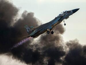 The source said the Israeli assault was an attempt to "divert attention away from the successes of" government forces on the battleground against militants. (AFP/Jack Guez)