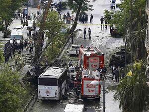 Fire engines are seen beside a Turkish police bus that was targeted in a bomb attack in a central Istanbul district, Turkey, June 7, 2016. (Twitter)