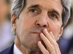 U.S. Secretary of State John Kerry waits to deliver his speech before delegates on March 2, 2015 at the opening day of UN Human Rights council session at the United Nations offices in Geneva. (AFP/Fabrice Coffrini)