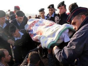 Jordanian mourners carry the body of Kamal Malkawi, who was killed in a shooting attack at the International Police Training Centre in Al-Muwaqqar, Zarqa, Jordan, November 10, 2015. (AFP/File) Jordanian mourners carry the body of Kamal Malkawi, who was killed in a shooting attack at the International Police Training Centre in Al-Muwaqqar, Zarqa, Jordan, November 10, 2015. (AFP/File)